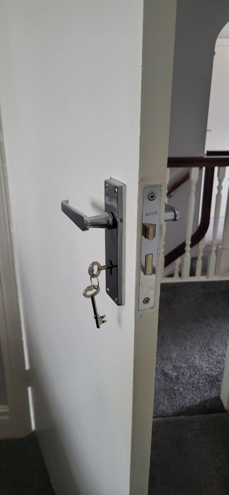 Chrome 3-lever sash mortice lock fitted to an internal wooden door by A Slater & Son locksmith