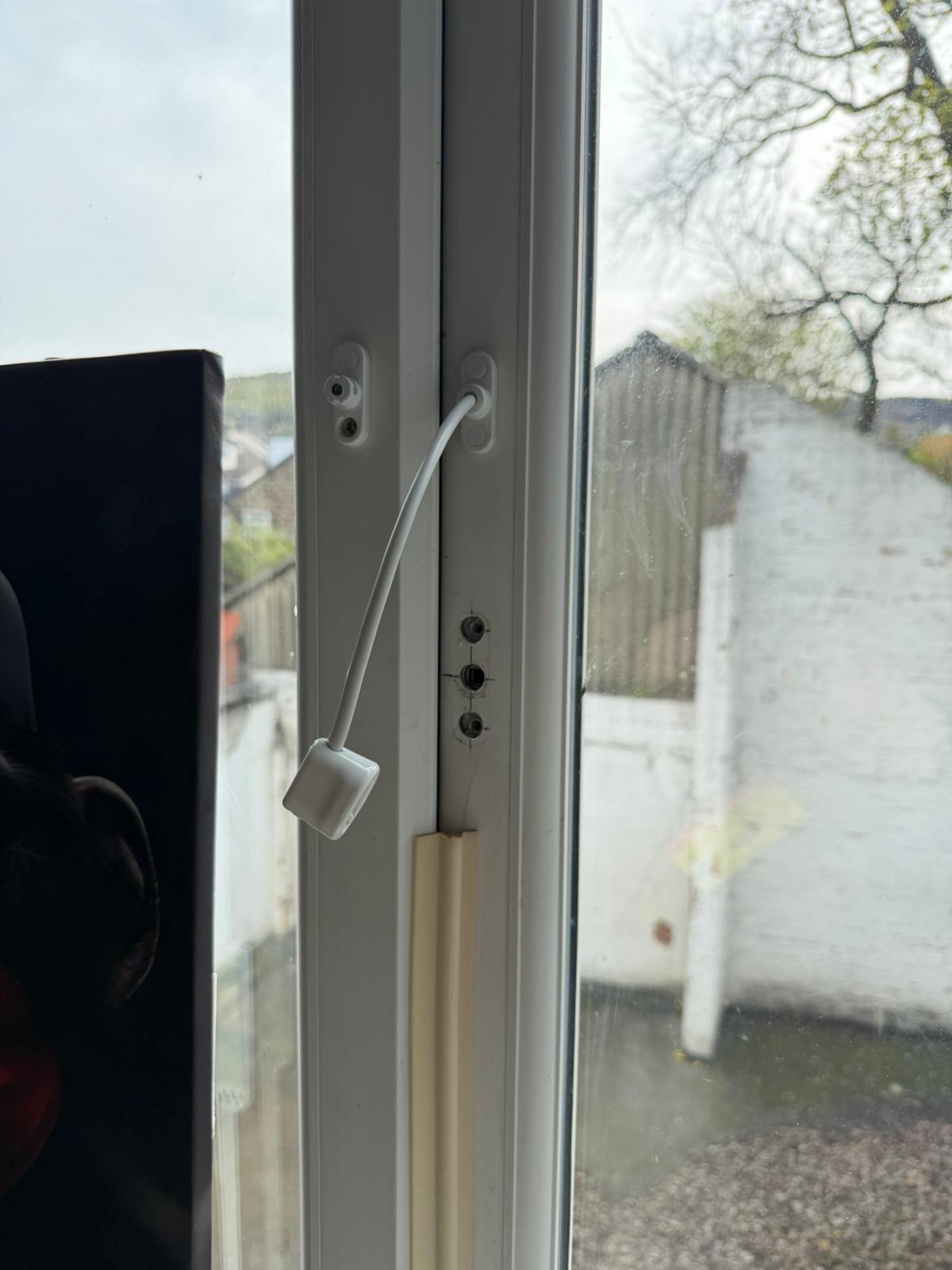 Child-safe uPVC window restrictor cable lock installed in Teesside